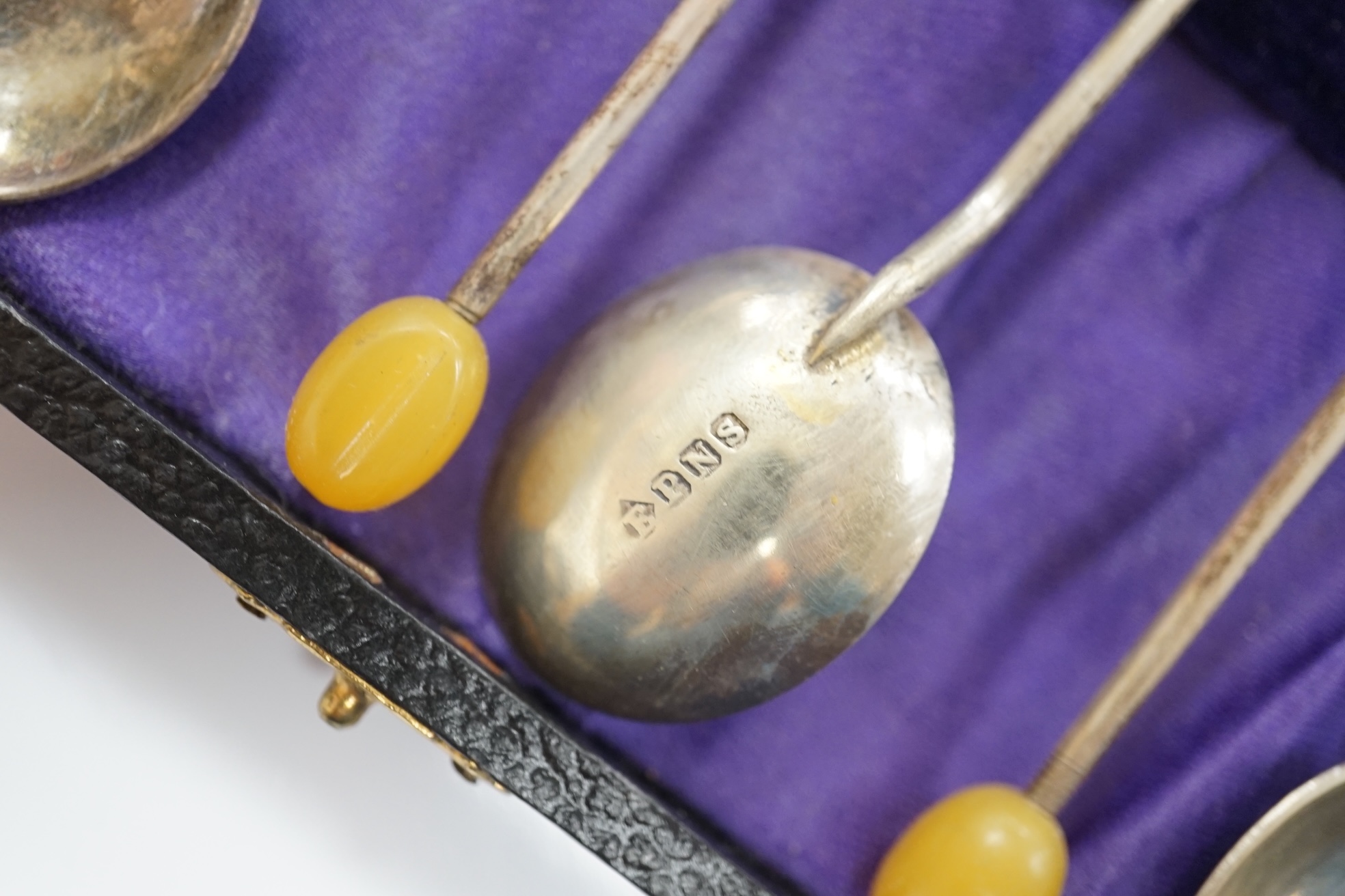 An Elizabeth II silver quatrefoil dish by James Dixon & Sons, Sheffield, 1967, 14.2cm, together with a silver spoon and pusher, silver bonbon dish, pair of silver wishbone nips and a cased set of plated spoons. Condition